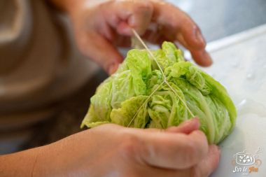 Pannequets met groene kool, foie gras en gekonfijte eendenbout